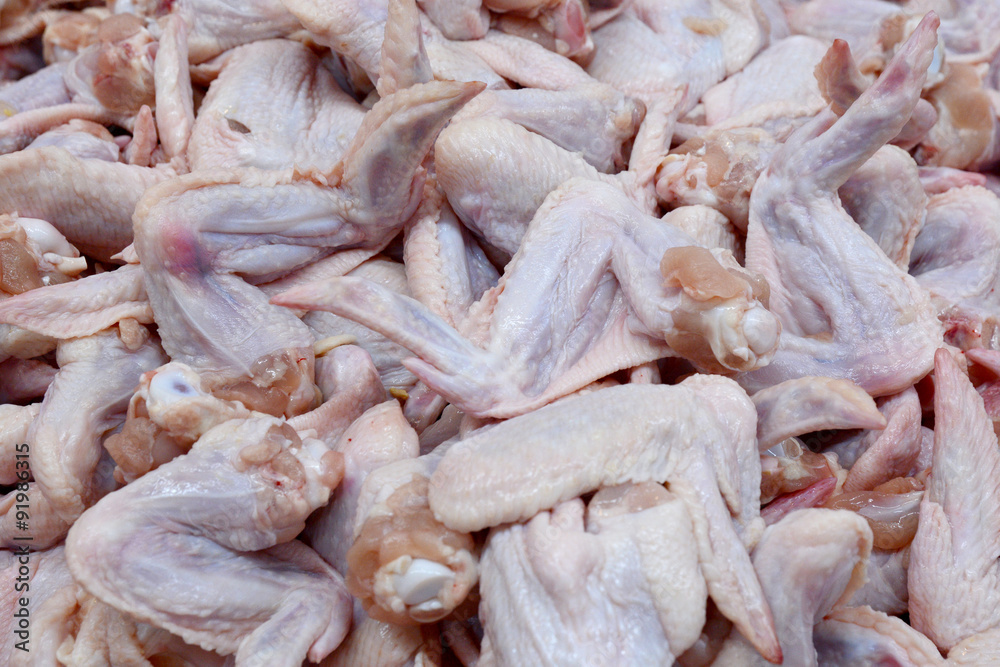 Raw chicken wings in the market Raw chicken wings in the market