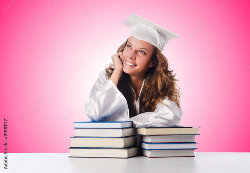 Happy graduate with lots of books on white Happy graduate with lots of books on white
