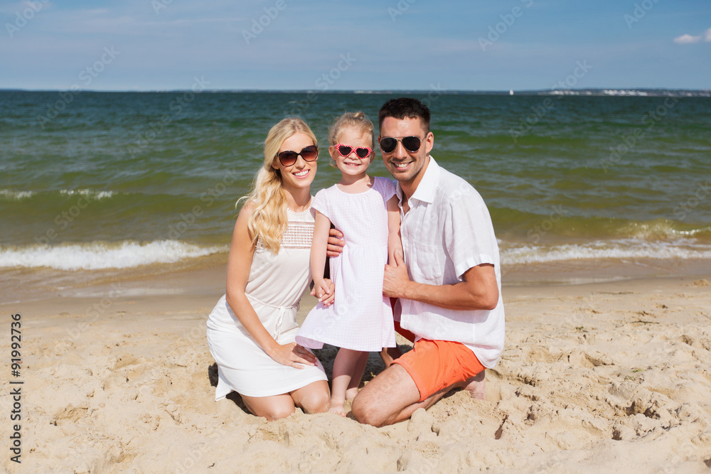 happy family in sunglasses on summer beach happy family in sunglasses on summer beach
