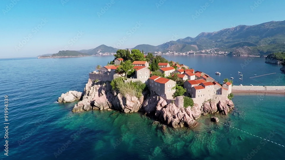 Flying over the island of Sveti Stefan, Montenegro, the Balkans - aerial photography