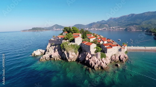 Flying over the island of Sveti Stefan, Montenegro, the Balkans - aerial photography photo