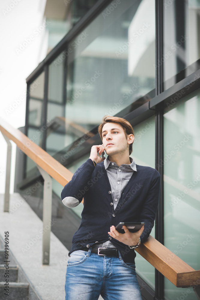 Knee figure of a young handsome caucasian contemporary businessm Knee figure of a young handsome caucasian contemporary businessm