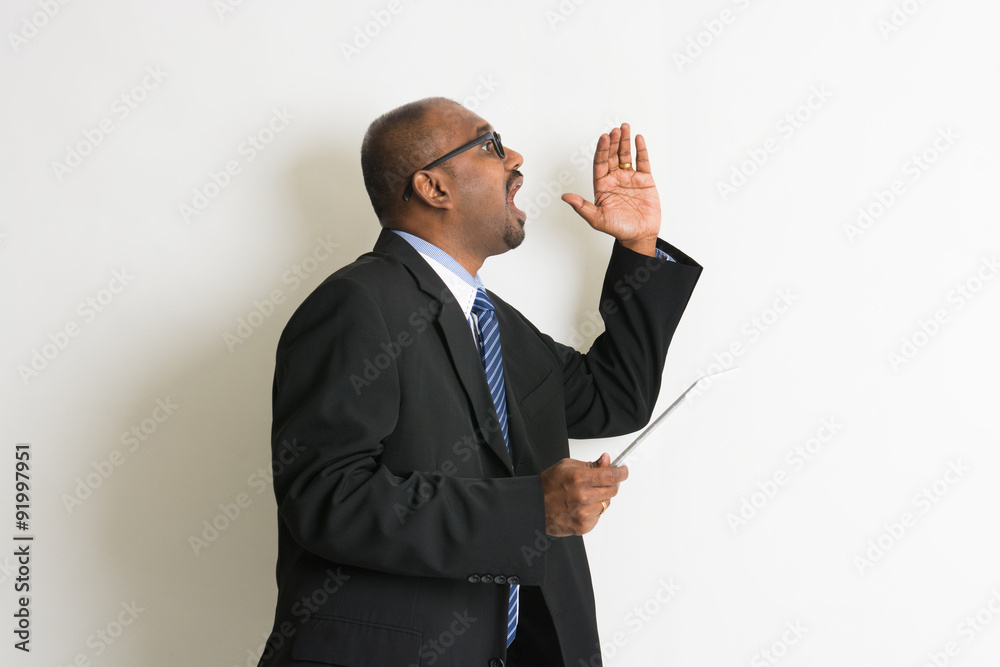 indian businessman with tablet shouting and shock indian businessman with tablet shouting and shock