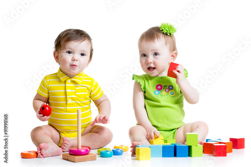 Two adorable kids playing w...