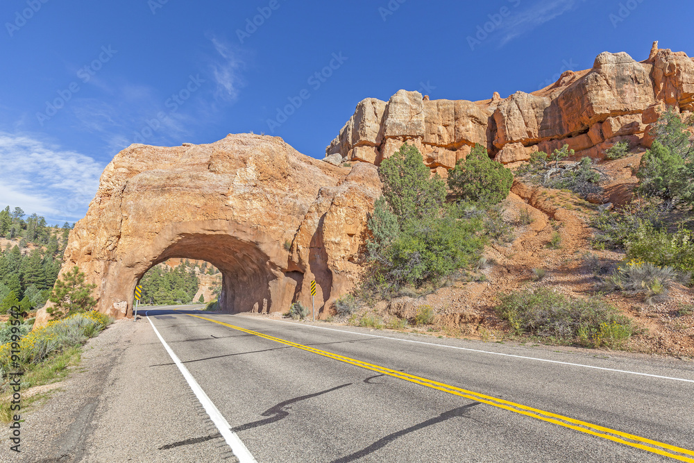 Natural arch road tunnel on the Scenic Byway 12, Utah, USA. Natural arch road tunnel on the Scenic Byway 12, Utah, USA.