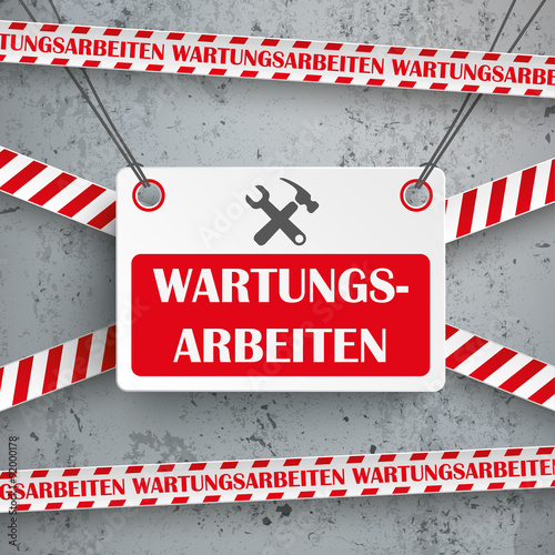 Wartungsarbeiten Schild vor einer Betonwand