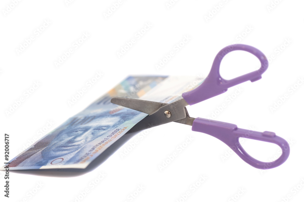 One hundred swiss franc banknotes with scissors.currency of swit - obrazy, fototapety, plakaty 