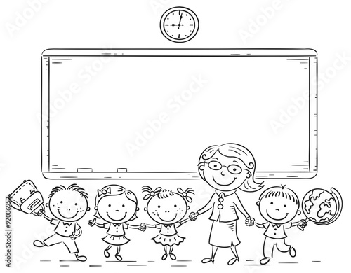 Schoolkids and teacher at the blackboard