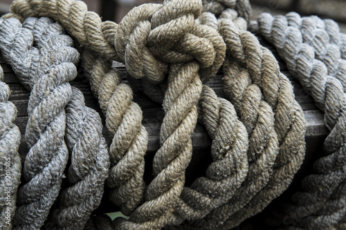 Close-up of an old frayed boat rope as a nautical background.
