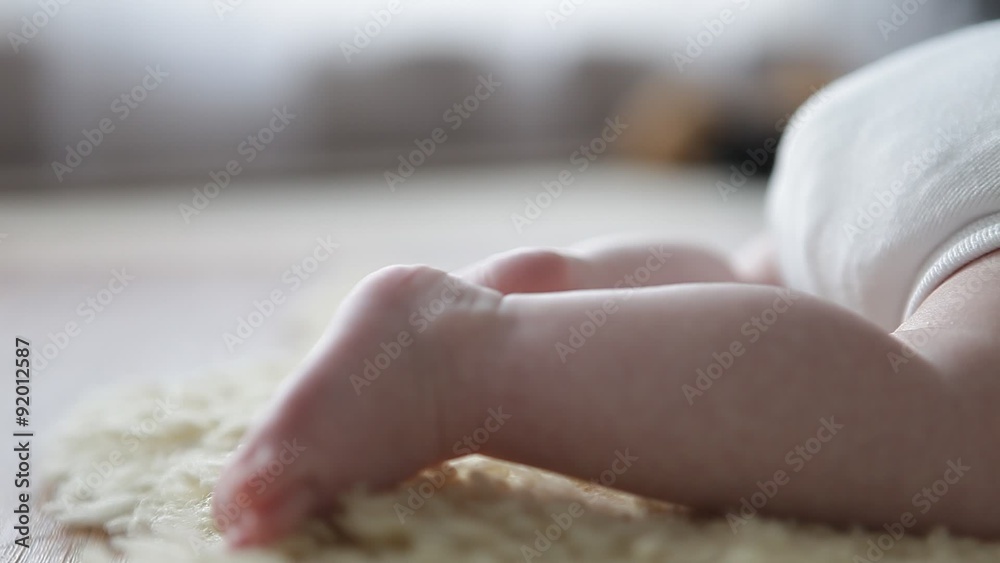 moving feet of a little baby