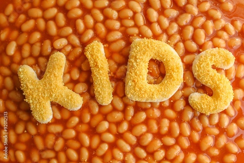 Kids Meal - Baked beans with tomato sauce with breaded letters spelling the word KIDS