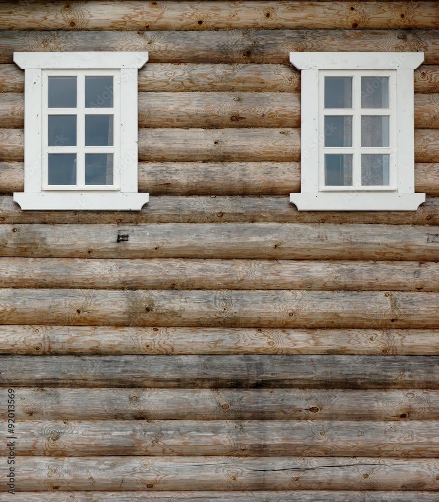 Log Cabin Wall With Two Ornamental Windows Log Cabin Wall With Two Ornamental Windows