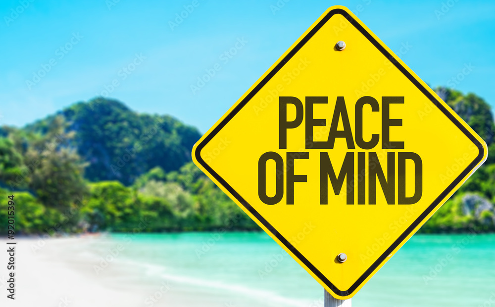 Peace of Mind sign with beach background