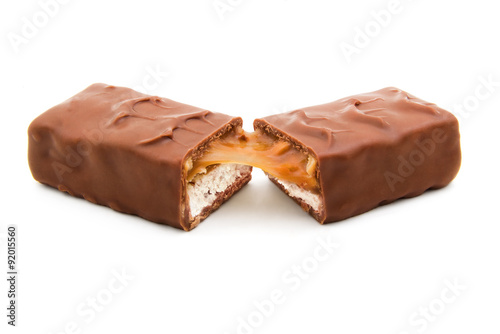 Fotografie Two cut halves of chocolate bar isolated on white