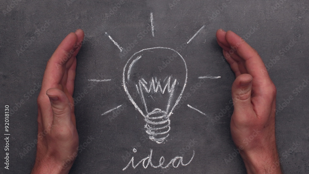 Hands showing idea bulb chalk drawing, stop motion animation