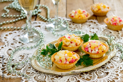 Mini tart with crab meat and sweet corn salad photo