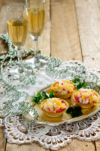 Mini tart with crab meat and sweet corn salad photo