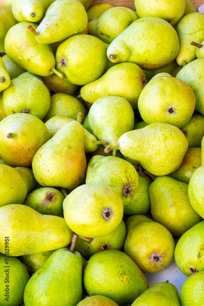 Green ripe pears  for sale at the market