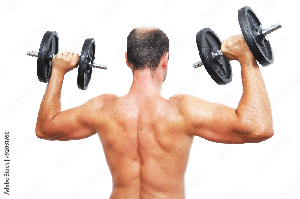 A man working-out with a dumbbell A man working-out with a dumbbell