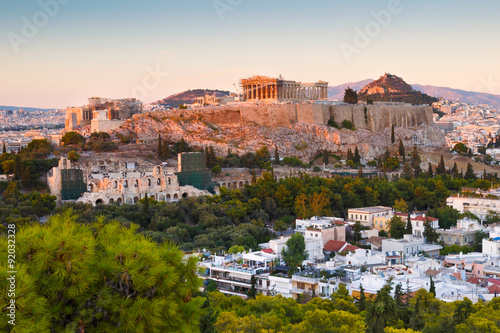 Fototapeta Naklejka Na Ścianę i Meble -  Evening view of Acropolis from Filopappou hill in central Athens.