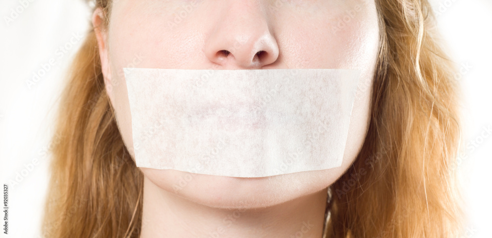 Fototapeta premium woman with mouth sealed