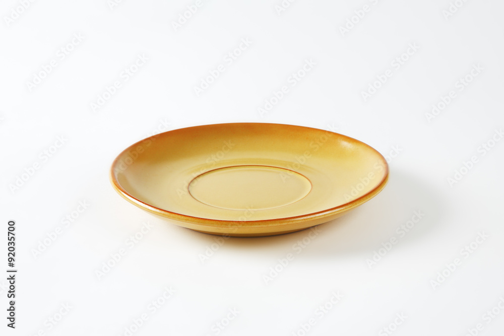 Light brown saucer Light brown saucer