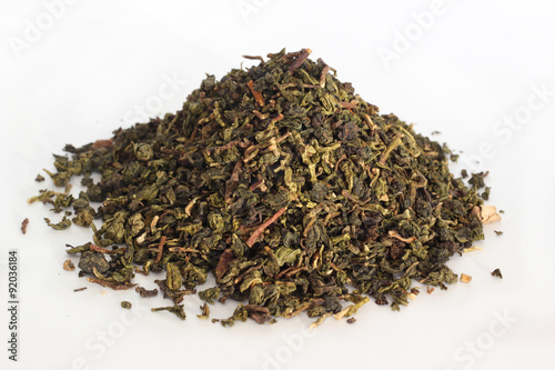 А bunch of green tea on white background