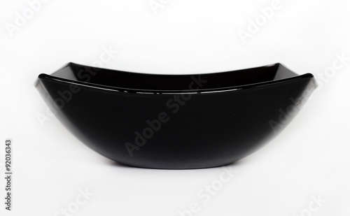 Black plate isolated on white background