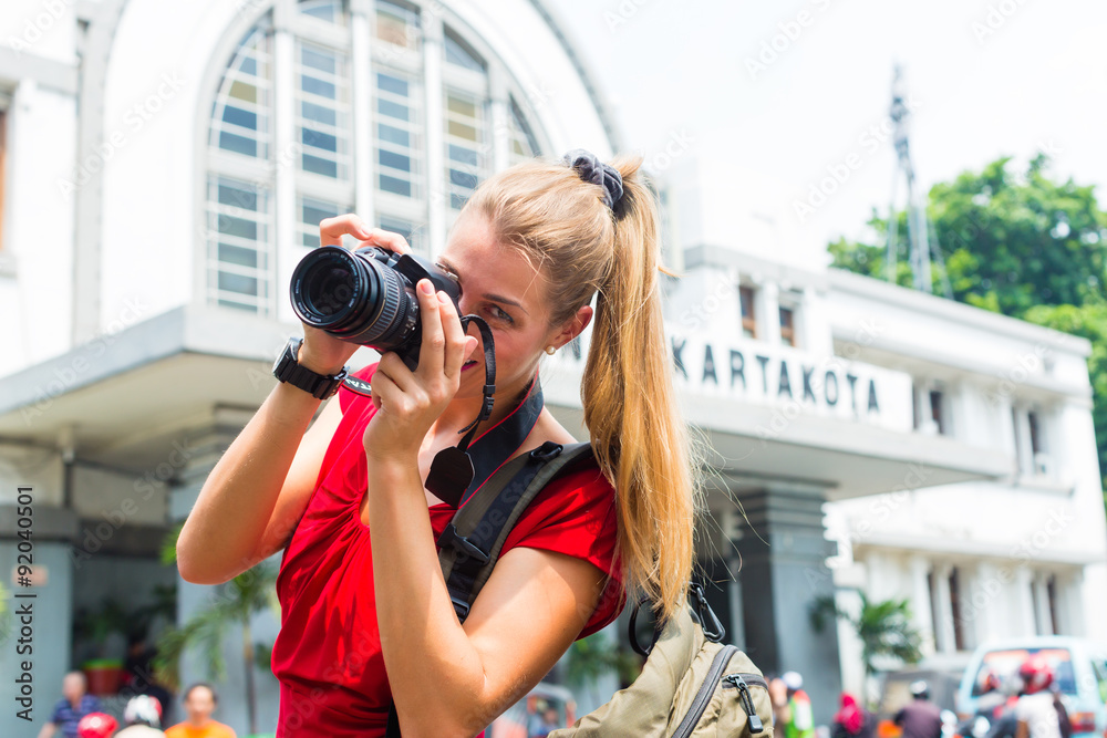 Tourist taking pictures at Jakarta Train Station
