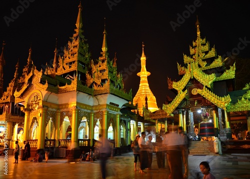 Yangon, Shwedagon - March 9 2015: Prayers on temple area in Shewedagon Myanmar