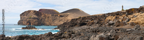 Beacon Capelinhos on the shore of Atlantic ocean, island Faial,