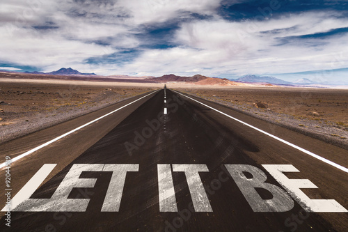 Fotografia Let It Be written on desert road