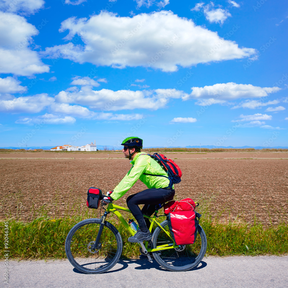 Obraz premium MTB Biker Bicycle touring with pannier racks