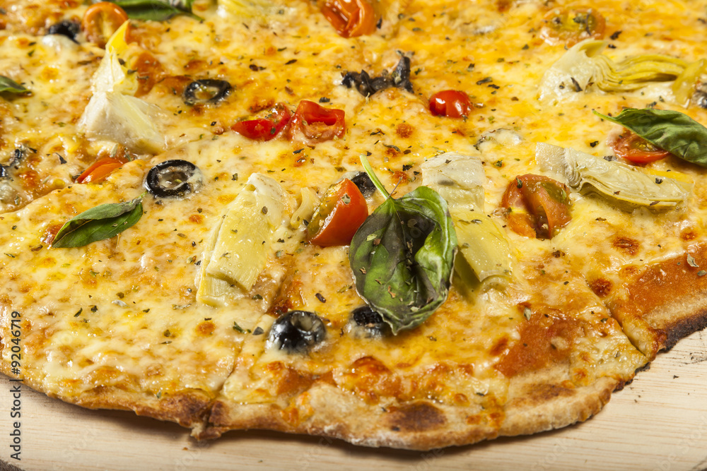 Vegetarian pizza ready to serve. Vegetarian pizza ready to serve.