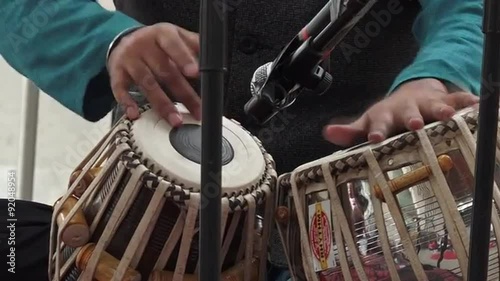 Indian man playing Indian musical instruments Tabla Punjabi drums photo