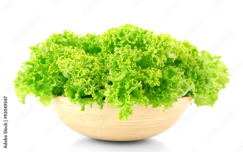 Green fresh lettuce in bowl isolated on white Green fresh lettuce in bowl isolated on white