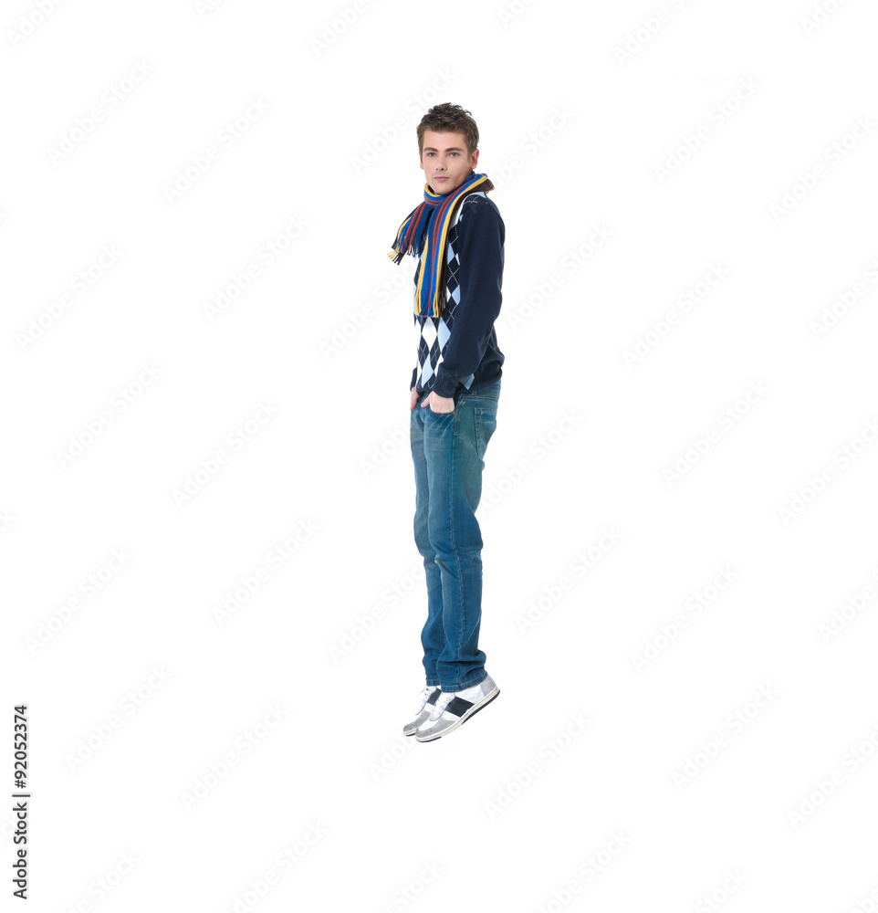 Handsome casual young man jumping on white background
Handsome casual young man jumping on white background