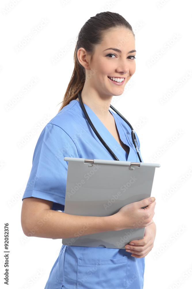 Young intern nurse posing holding a medical history Young intern nurse posing holding a medical history
