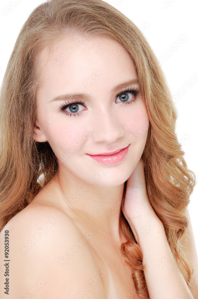 smiling young woman resting her chin on hand smiling young woman resting her chin on hand