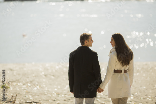 Young couple by the river