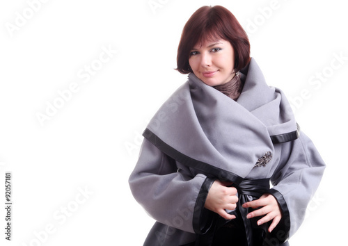 brunette short-haired girl in stylish grey coat photo