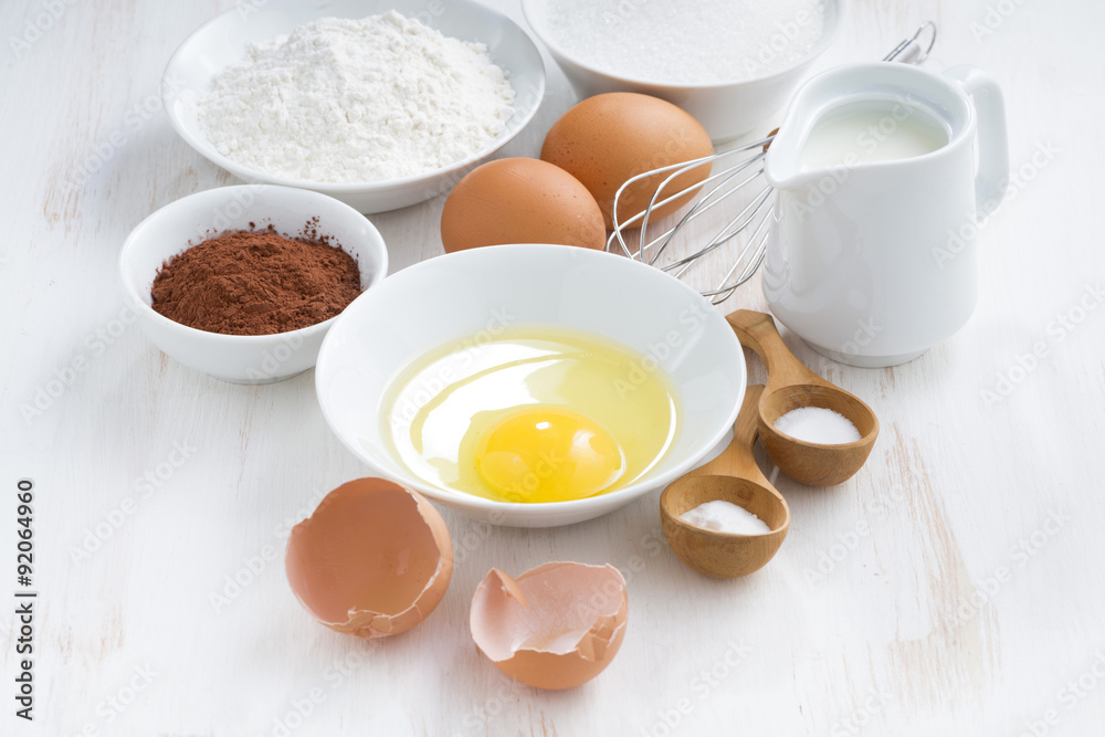 fresh ingredients for baking on a white table, horizontal fresh ingredients for baking on a white table, horizontal