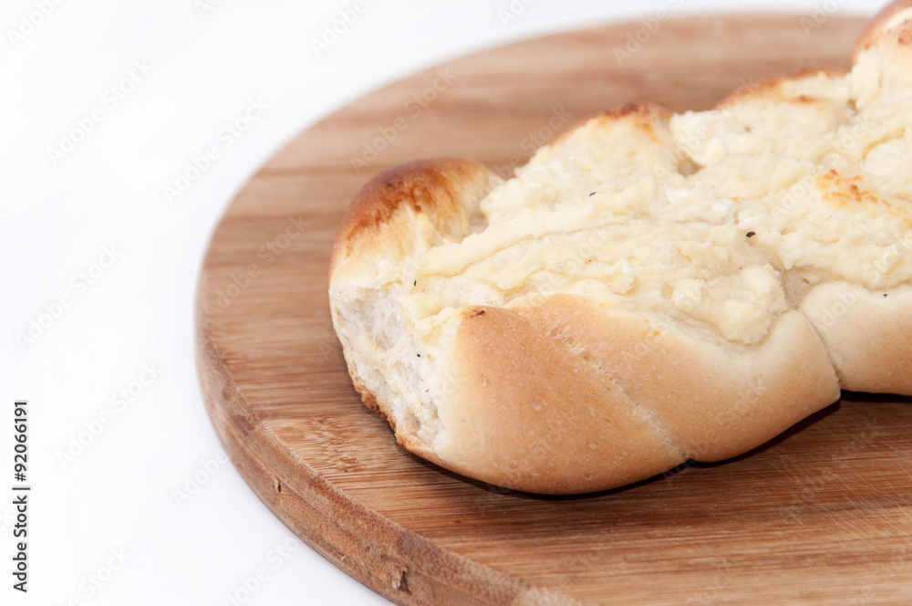 Pastry stuffed with cheese on the wooden board Pastry stuffed with cheese on the wooden board