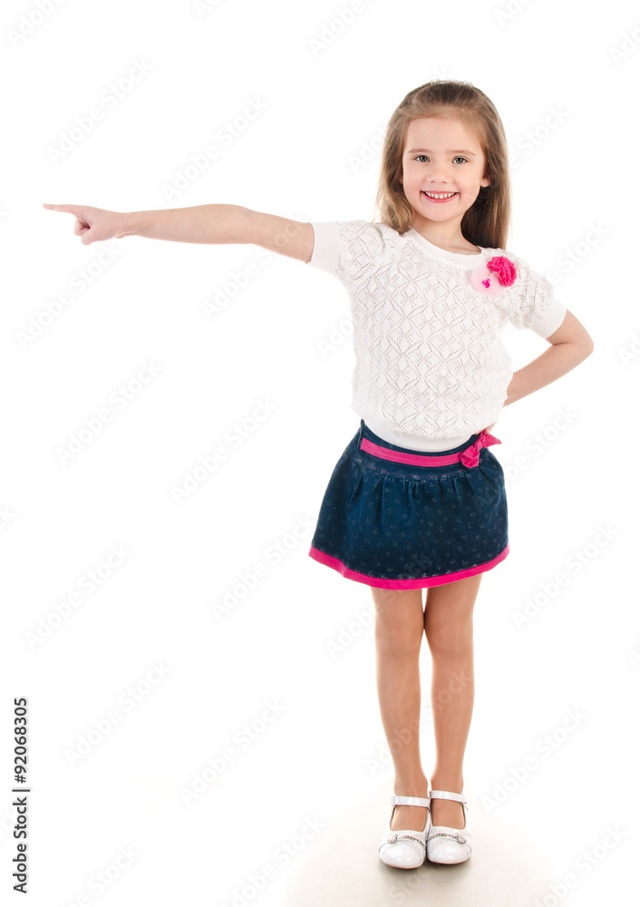 Smiling little girl points direction by forefinger Smiling little girl points direction by forefinger