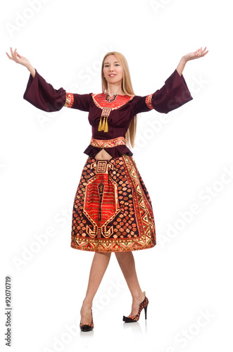 Woman in dress with oriental prints isolated on white