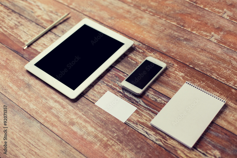 Fototapeta premium close up of notebook, tablet pc and smartphone