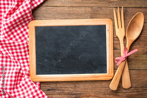 Blackboard with a red checkered tablecloth