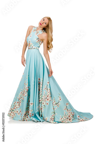 Woman in blue long dress with flower prints isolated on white photo