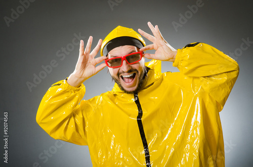 Funny man wearing yellow suit © Elnur