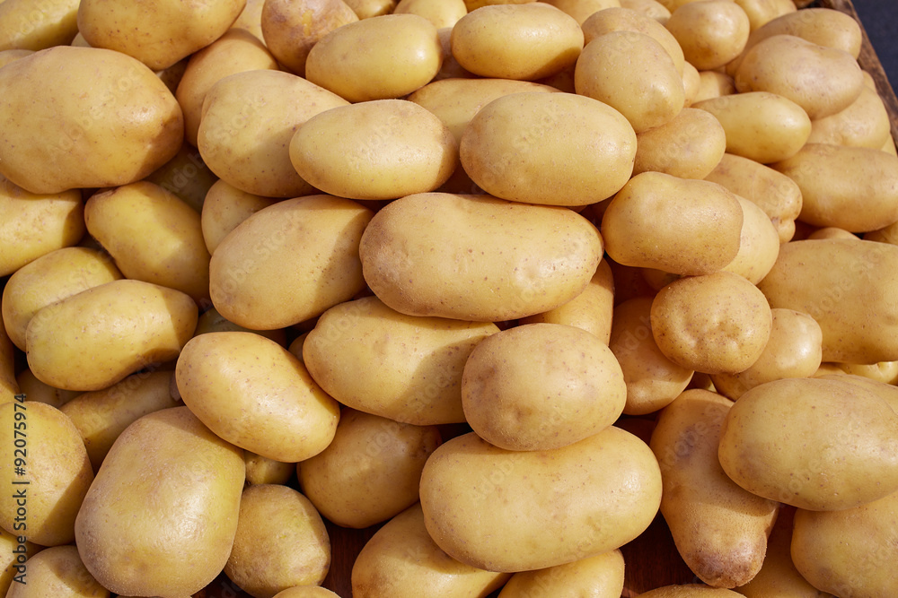 Potatoes background vegetables texture in market Potatoes background vegetables texture in market